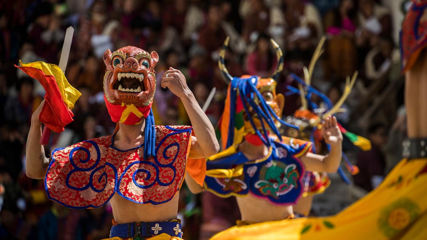 Homme avec un masque de tigre, Festival de Tshechus, Bhoutan
