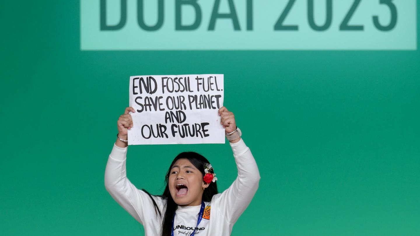 Protester onstage at the Global Climate Action High-Level Event