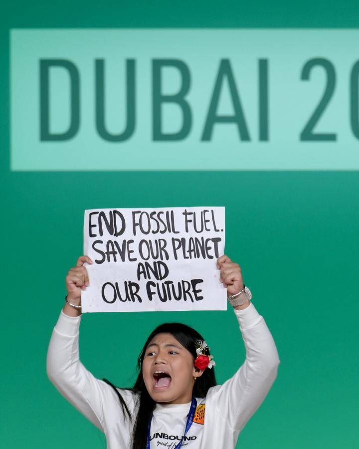 Protester onstage at the Global Climate Action High-Level Event